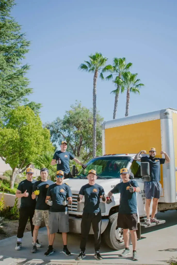Movers carrying furniture during a move